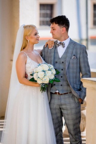 Ms. Marta shared some photos from her wedding behind us