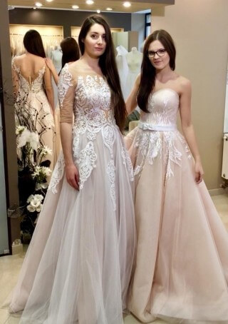 Beautiful friends and beautiful Lorange and Sutres wedding dresses
